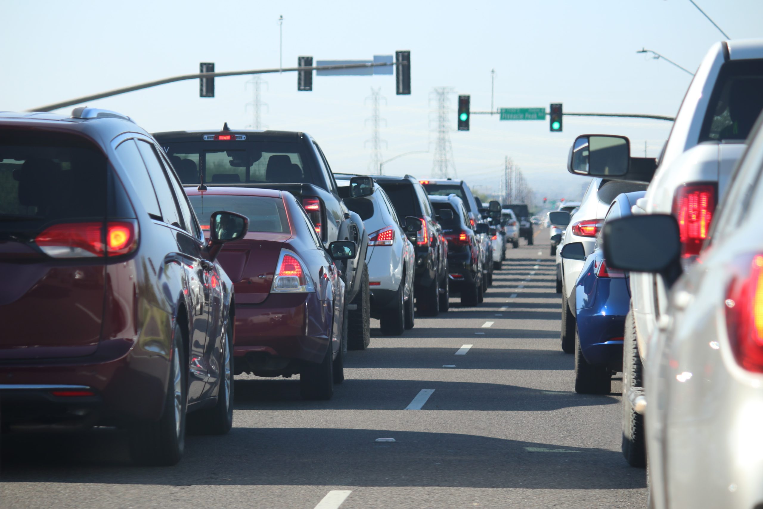 Cars sit in traffic gridlock during the day.