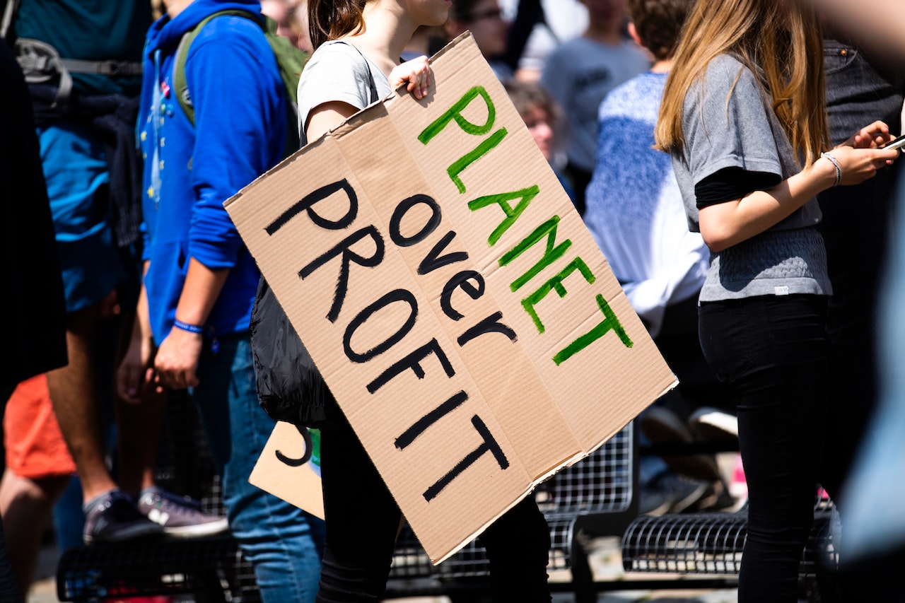 demonstrator holding sign