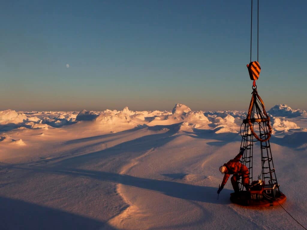 Scientist testing sea ice.