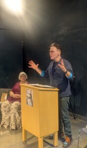 Poet speaking with his hands